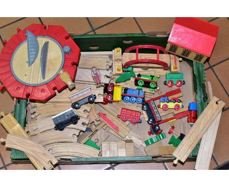 A QUANTITY OF UNBOXED AND ASSORTED BRIO &amp; ELC WOODEN PUSH ALONG TRAINS, TRACK AND ACCESSORIES contains a quantity of Thom