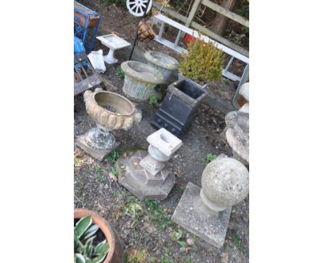 EIGHT VARIOUS GARDEN ORNAMENTS/PLANTERS to include a pair of composite urns height 48cm, a distressed early 20th century urn 