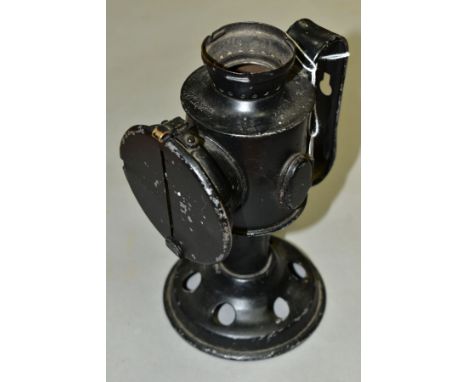 AN INCOMPLETE BLADON SIGNALLING/TRENCH LAMP, painted black, marked 1942, height 19cm