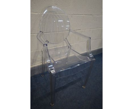 AFTER PHILIPE STARCK FOR KARTELL, a clear louis ghost armchair, unsigned (the item in this lot is the remanence of a fire dam