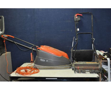 A FLYMO TURBO COMPACT 380 LAWN MOWER (PAT pass and working) and a Black and Decker Lawn Raker (untested) (2)