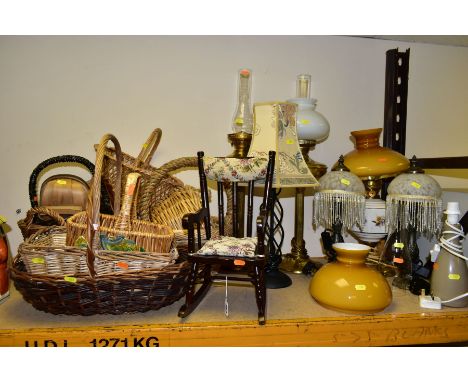 A GROUP OF LAMPS, BASKETS AND A MODERN DOLL SIZED ROCKING CHAIR, wooden chair height 38.5cm has cushion and back rest, lamps 