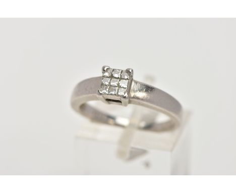A PLATINUM DIAMOND RING, designed with a square cluster of nine princess cut diamonds, stamped diamond weight 0.25cts, plain 
