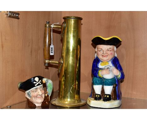 AN EARLY 20TH CENTURY BRASS FLAGON OF ARTS AND CRAFTS STYLE AND TWO CERAMIC ITEMS, the flagon of cylindrical form with wooden