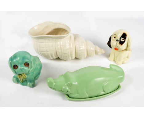 CARLTON WARE; an unusual butter dish modelled as a green crocodile, length 27cm, two Crown Devon models of seated puppies and