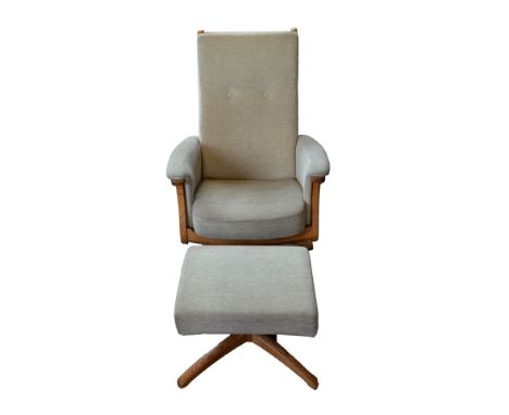 ERCOL: an upholstered easy chair and stool.