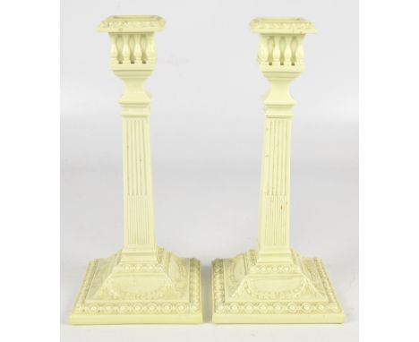 SOWERBY; a pair of Queens ivory candlesticks, both with impressed mark inscribed 'Queen Ann [sic] Candlestick, J. Mortlock & 