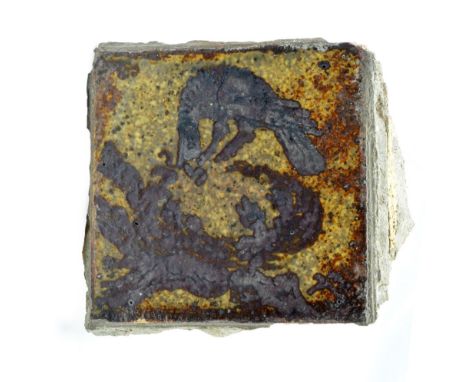 BERNARD LEACH (1887-1979) for Leach Pottery; a stoneware tile depicting a bird on a nest feeding its young, painted early LB 