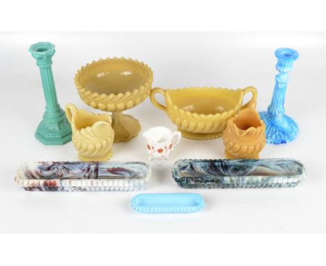 EDWARD MOORE; a blue and white candlestick, height 19cm, a green candlestick, height 20cm, four pieces of caramel coloured mo