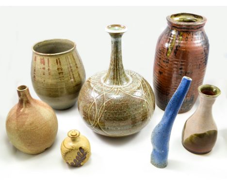 A group of studio ceramic vases and a lamp base, various makers, tallest height 35cm (7).   CONDITION REPORT:  Appears good w