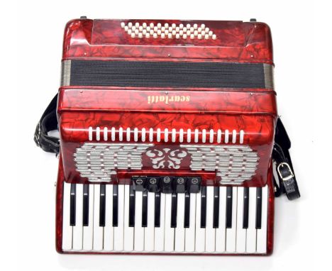 Scarlatti forty-eight button piano accordion with five switches, red marble finish, case 