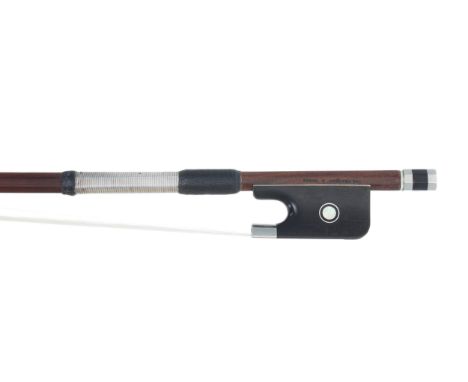 Nickel mounted violoncello bow stamped Vtor Fetique á Paris, the stick octagonal, the ebony frog inlaid with nickel rings enc