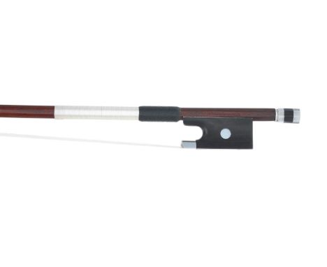 Silver mounted violin bow stamped Louis Bazin, the stick round, the ebony frog inlaid with pearl eyes and the ebony adjuster 