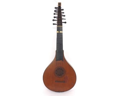 An English guittar by Michael Rauche, London, third quarter of the 18th century, the two piece back and ribs of maple, the ta