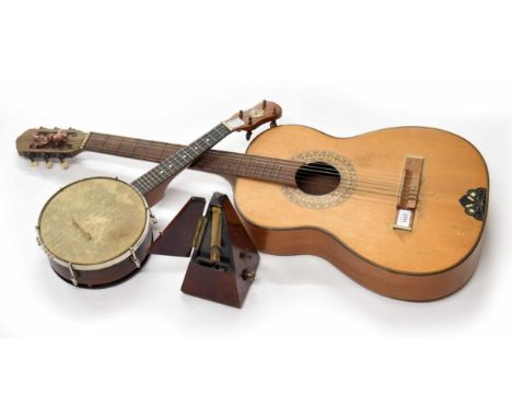 Old unnamed classical guitar;&nbsp;also an old ukulele banjo with plated shield inscribed Dulcetta B.S. London with 8" skin, 