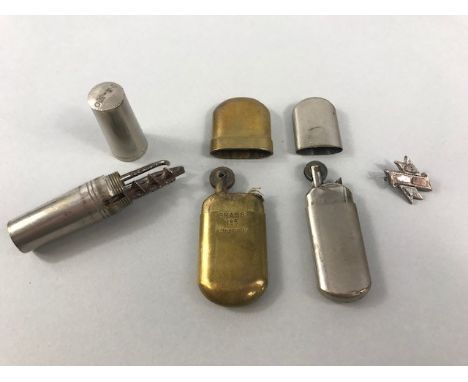 WWI brass Kingsway lighter plus one other, a WWI multi tool and a WWI sweetheart brooch