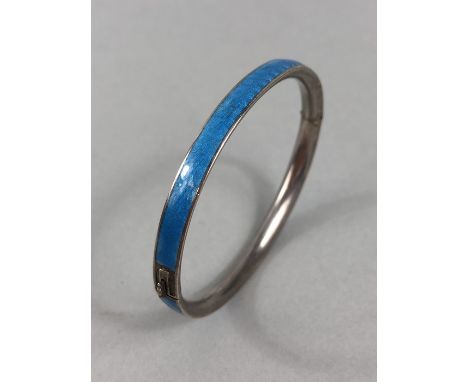 Silver Enamel (NO damage) Bangle. The sky blue enamel band measures approx: 5.77mm wide, stamped 925, gilt, Made in Italy. We