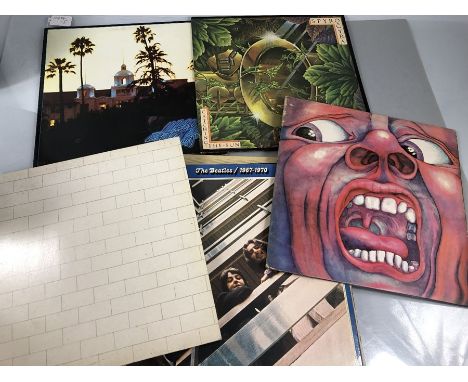 LP's Long playing records ten of: David Bowie, Rick Wakeman, Meatloaf, Art Garfunkel, Bob Marley, The Beatles 1967 - 1970, Ki