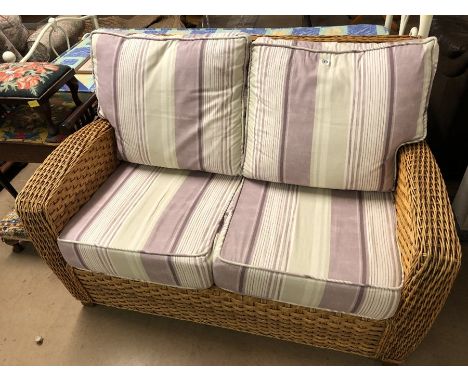 Two-seater conservatory sofa with newly re-covered cushions