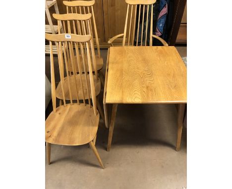 Ercol: Ercol Dining table and four blonde stick back mid century style chairs (one carver)