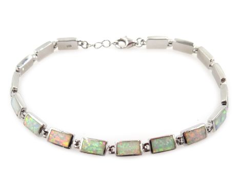 Silver rectangular opal link bracelet, stamped 925 Condition Report Click here for further images, condition, auction times &