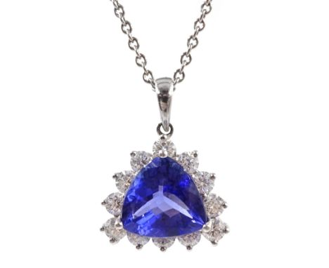 18ct white gold tanzanite and diamond cluster pendant, stamped 750 on platinum chain necklace, stamped 950, tanzanite 2.5 car