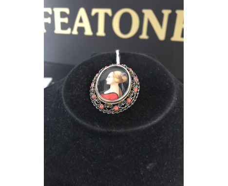 ITALIAN PENDANT/BROOCH REVERSE PAINTED PORTRAIT OF A YOUNG LADY SET IN AN OVAL (.800 FINESS SILVER) OPEN WORK MOUNT SET WITH 
