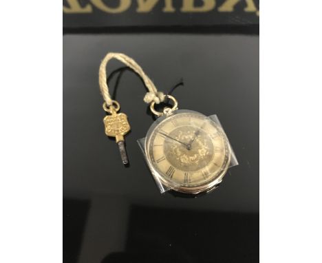 LADIES ANTIQUE 14K. GOLD POCKET WATCH ENGINE TURNED DECORATION & KEY