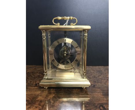 MODERN BRASS SKELETON CARRIAGE CLOCK BY KUNDO WITH QUARTZ MOVEMENT MADE IN WEST GERMANY.