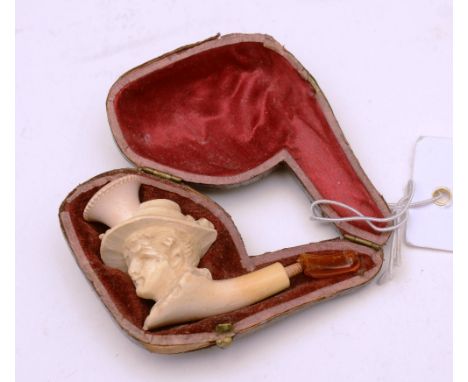 A Meersham pipe, modelled as a lady wearing a hat