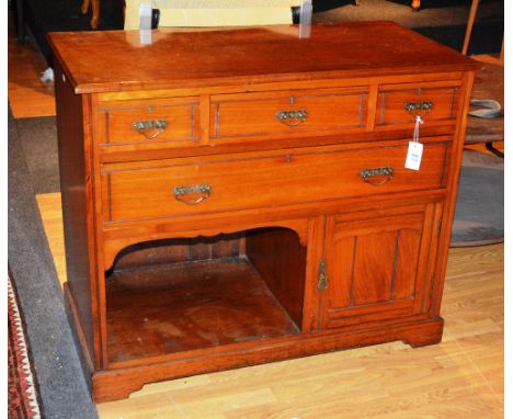 A chest, with chamfered rectangular top over a combination of drawers, cupboards and alcoves, raised on bracket feet, 100cm w