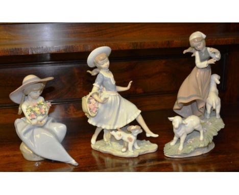Three boxed Lladro figure groups, including Country Life 010 06964, Fragment Bouquet 05862 and Mirth in the Country 04920 (3)