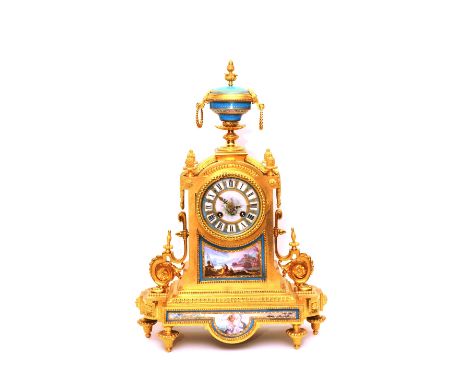 A fine French ormolu and porcelain mantle clock, late 19th Century in the Servres style, striking bell movement, with urn fin