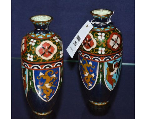 A pair of cloisonne bottle vases, each with floral neck over shield panels, with exotic birds and dragons, 18.5cm high (2) CO