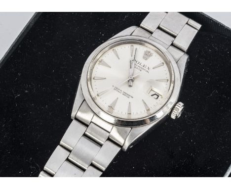 A vintage Rolex Oyster Perpetual Date stainless steel wristwatch, 34mm, silvered dial with baton numerals and date aperture, 