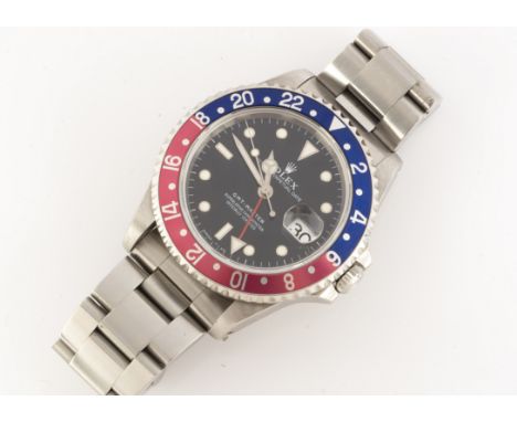 ROLEX, A 1990s Rolex Oyster Perpetual GMT Master "Pepsi" stainless steel wristwatch, ref. 16700, 40mm, black dial with dots a