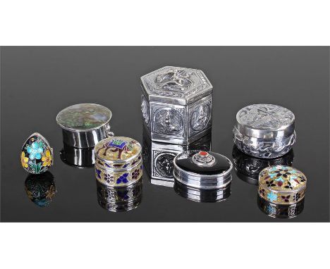Seven silver pill boxes, round with raised and engraved decoration of chariot and archer, octagonal with raised decoration de