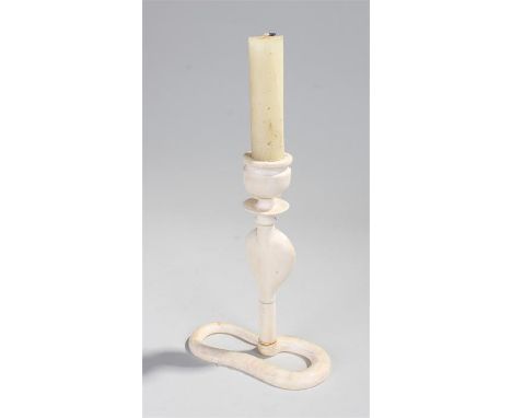 Early 20th Century Indian ivory candlestick, carved in the form of a cobra, 19cm high