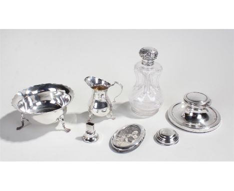 Collection of silver, various dates and makers, to include a capstan inkwell, a glass bottle, a bowl, jug, frame and two lids