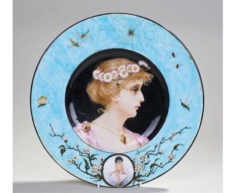 Theodore Deck circular wall plate, “Printemps”, the centre decorated  with a head and shoulders portrait of a young lady wear