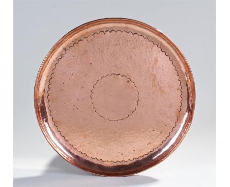 Newlyn copper tray, with a central vacant medallion and hammered surround, signed Newlyn, 32cm wide 