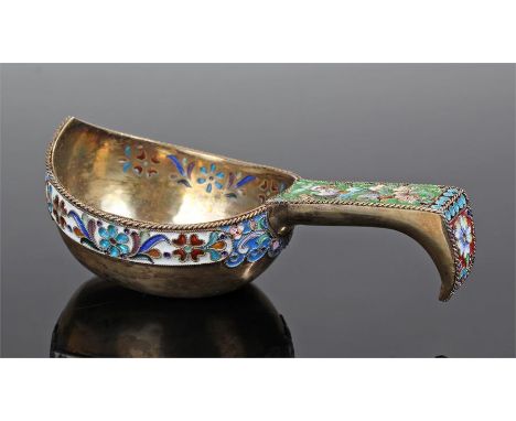 Russian Silver and enamel kovsh, the arched handle with a deep silver and gilt and enamel bowl, decorated in polychrome ename