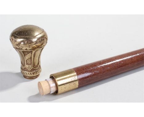 Novelty walking stick, the gilt metal screw top with a sprung whisky flask to the interior, 88cm high