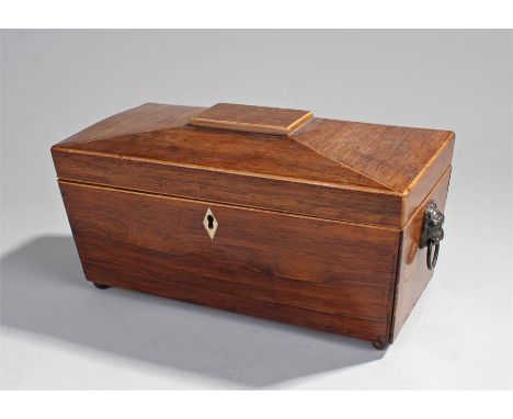 Victorian rosewood tea caddy, the boxwood inlaid top enclosing three compartments flanked by lion marks and ball feet, 30cm w
