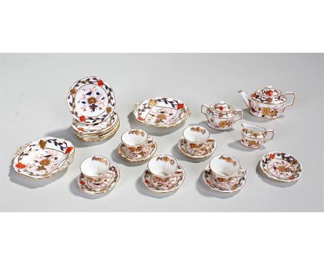 Royal Crown Derby porcelain miniature tea service, consisting of a tea pot, sugar bowl and milk jug, five tea cups and six sa