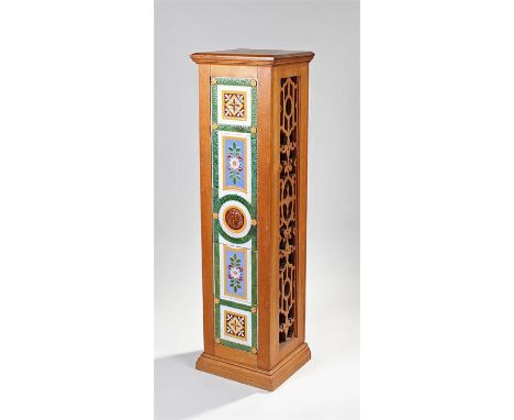 Minton's majolica tile inset column, the oak column with fret sides housing the tile set to the front, 117cm high x 33cm wide