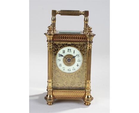 R & Co gilt brass carriage clock, the case with fluted columns and ball finials, five glass case with bevelled edge, white en