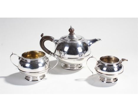 George V silver bachelors three piece tea service, Birmingham 1921, maker Henry Clifford Davis , the dome shaped teapot, suga