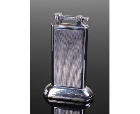 Dunhill silver plated table lighter, with engine turned decoration, R.H.Y.C. lettering to the foot, 10cm high