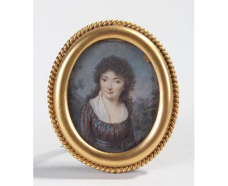18th Century English school, a portrait miniature of a lady in a dress, oil on ivory, 6cm wide